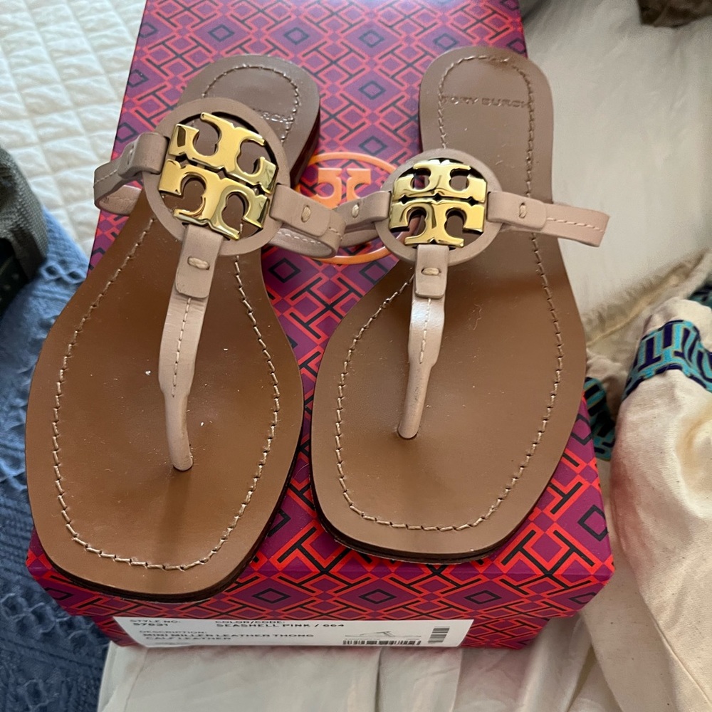 Tory Burch Sandals. Only worn a few times. Too big for my narrow foot.